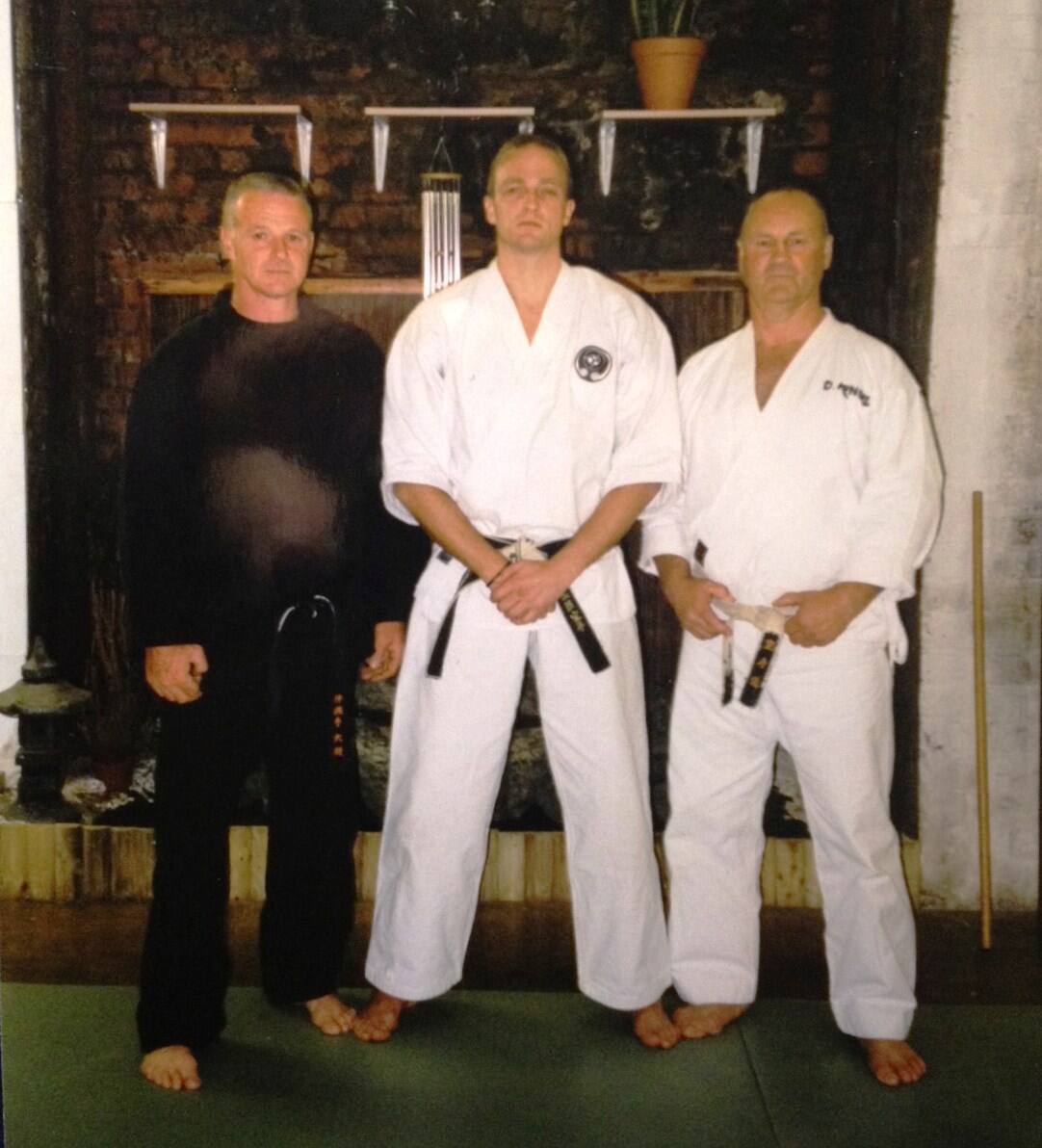 DKK crew with title belts