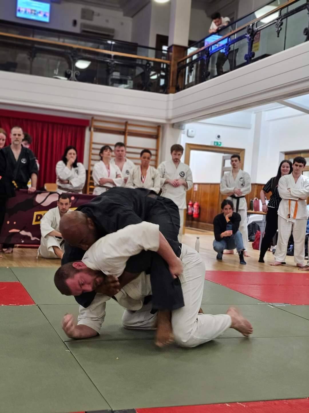 Throw with crowd watching